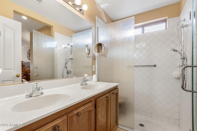 Impeccably maintained 2-bedroom, 2-bathroom Doral model home on Tuscany Falls At Pebble Creek in Arizona - for sale on GolfHomes.com, golf home, golf lot