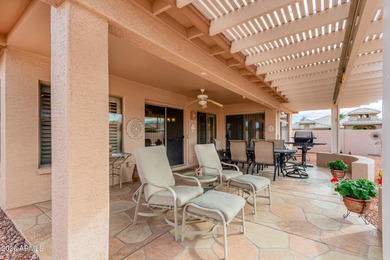 Impeccably maintained 2-bedroom, 2-bathroom Doral model home on Tuscany Falls At Pebble Creek in Arizona - for sale on GolfHomes.com, golf home, golf lot