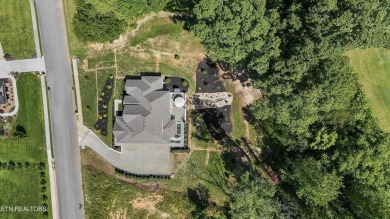 Perched on a hill, this stunning 4 BR, 2.5 BA home is better on Landmark Golf Club At Avalon in Tennessee - for sale on GolfHomes.com, golf home, golf lot