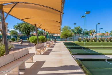 Impeccably maintained 2-bedroom, 2-bathroom Doral model home on Tuscany Falls At Pebble Creek in Arizona - for sale on GolfHomes.com, golf home, golf lot