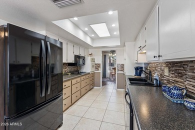 This 1,832 sq ft Sun City home delivers one of the community's on PalmBrook Country Club in Arizona - for sale on GolfHomes.com, golf home, golf lot