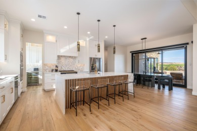 Experience refined desert living in this stunning custom home on The Ledges Golf Club in Utah - for sale on GolfHomes.com, golf home, golf lot