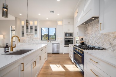 Experience refined desert living in this stunning custom home on The Ledges Golf Club in Utah - for sale on GolfHomes.com, golf home, golf lot