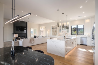 Experience refined desert living in this stunning custom home on The Ledges Golf Club in Utah - for sale on GolfHomes.com, golf home, golf lot