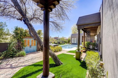 A true Troon oasis! This beautiful custom home was perfectly on Troon Country Club in Arizona - for sale on GolfHomes.com, golf home, golf lot