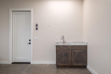 Experience refined desert living in this stunning custom home on The Ledges Golf Club in Utah - for sale on GolfHomes.com, golf home, golf lot