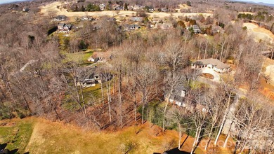 This fantastic half-acre lot offers an exceptional opportunity on Rock Barn Golf and Spa in North Carolina - for sale on GolfHomes.com, golf home, golf lot
