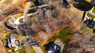 This fantastic half-acre lot offers an exceptional opportunity on Rock Barn Golf and Spa in North Carolina - for sale on GolfHomes.com, golf home, golf lot