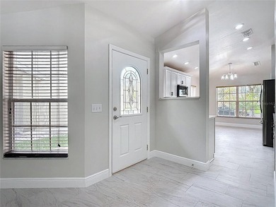 Some photos are virtually  staged. ***See the FULL LENGTH VIDEO on Stonegate Golf Club in Florida - for sale on GolfHomes.com, golf home, golf lot