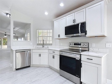 Some photos are virtually  staged. ***See the FULL LENGTH VIDEO on Stonegate Golf Club in Florida - for sale on GolfHomes.com, golf home, golf lot