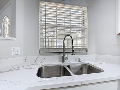 Some photos are virtually  staged. ***See the FULL LENGTH VIDEO on Stonegate Golf Club in Florida - for sale on GolfHomes.com, golf home, golf lot