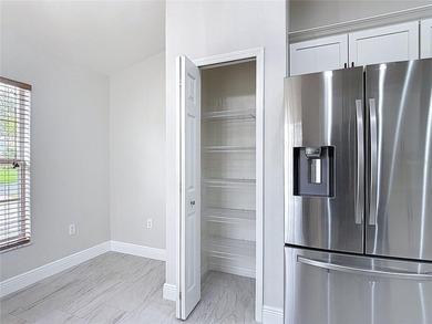 Some photos are virtually  staged. ***See the FULL LENGTH VIDEO on Stonegate Golf Club in Florida - for sale on GolfHomes.com, golf home, golf lot