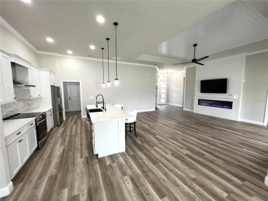 Built in 2023! This 4 bedroom, 3 bathroom, 3 car garage home has on The Grand Club - Pine Lakes Course in Florida - for sale on GolfHomes.com, golf home, golf lot