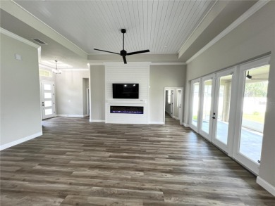 Built in 2023! This 4 bedroom, 3 bathroom, 3 car garage home has on The Grand Club - Pine Lakes Course in Florida - for sale on GolfHomes.com, golf home, golf lot