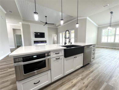 Built in 2023! This 4 bedroom, 3 bathroom, 3 car garage home has on The Grand Club - Pine Lakes Course in Florida - for sale on GolfHomes.com, golf home, golf lot