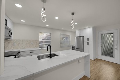 Fully renovated 2-bedroom, 2-bath condo designed for easy living on Kings Point Golf -Flanders Way in Florida - for sale on GolfHomes.com, golf home, golf lot