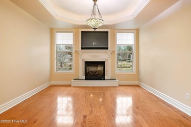 Welcome to your beautiful brick home overlooking a peaceful pond on Cape Fear National At Brunswick Forest in North Carolina - for sale on GolfHomes.com, golf home, golf lot