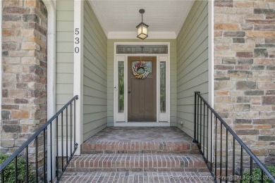 One of a kind custom, ranch-style home with courtyard entry and on Anderson Creek Golf Club in North Carolina - for sale on GolfHomes.com, golf home, golf lot