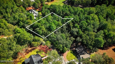 Nestled in the serene community of Seven Lakes South, this prime on Seven Lakes Country Club in North Carolina - for sale on GolfHomes.com, golf home, golf lot