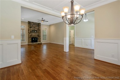 One of a kind custom, ranch-style home with courtyard entry and on Anderson Creek Golf Club in North Carolina - for sale on GolfHomes.com, golf home, golf lot