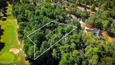 Nestled in the serene community of Seven Lakes South, this prime on Seven Lakes Country Club in North Carolina - for sale on GolfHomes.com, golf home, golf lot