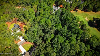 Nestled in the serene community of Seven Lakes South, this prime on Seven Lakes Country Club in North Carolina - for sale on GolfHomes.com, golf home, golf lot