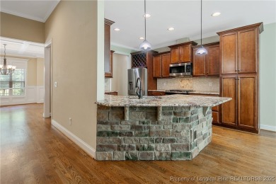 One of a kind custom, ranch-style home with courtyard entry and on Anderson Creek Golf Club in North Carolina - for sale on GolfHomes.com, golf home, golf lot