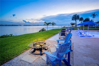 As soon as you enter this home, you are welcomed by the on Santa Lucia River Club in Florida - for sale on GolfHomes.com, golf home, golf lot