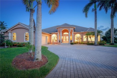 As soon as you enter this home, you are welcomed by the on Santa Lucia River Club in Florida - for sale on GolfHomes.com, golf home, golf lot