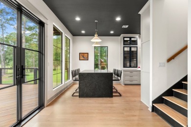 Experience unparalleled lakeside living at 147 Brushwood Ct on Rayburn Country Club in Texas - for sale on GolfHomes.com, golf home, golf lot