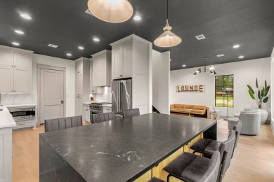 Experience unparalleled lakeside living at 147 Brushwood Ct on Rayburn Country Club in Texas - for sale on GolfHomes.com, golf home, golf lot