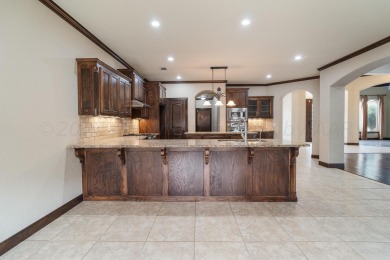 ASSUMABLE LOAN 3.2%! BRING ALL OFFERS! Nestled in the middle of on Tascosa Country Club in Texas - for sale on GolfHomes.com, golf home, golf lot