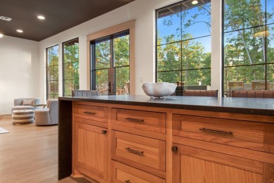 Experience unparalleled lakeside living at 147 Brushwood Ct on Rayburn Country Club in Texas - for sale on GolfHomes.com, golf home, golf lot