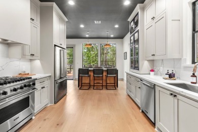 Experience unparalleled lakeside living at 147 Brushwood Ct on Rayburn Country Club in Texas - for sale on GolfHomes.com, golf home, golf lot
