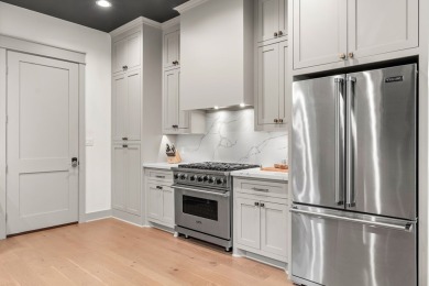 Experience unparalleled lakeside living at 147 Brushwood Ct on Rayburn Country Club in Texas - for sale on GolfHomes.com, golf home, golf lot