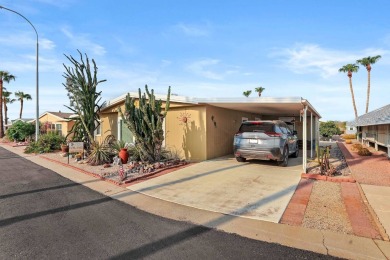 Lovely 2 bed, 2 bath home with an enclosed AZ room adding 250 sq on Apache Creek Golf Club in Arizona - for sale on GolfHomes.com, golf home, golf lot