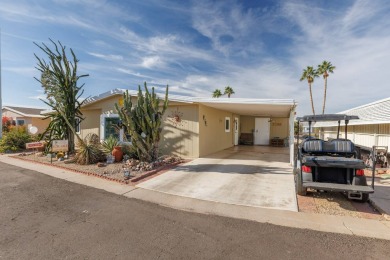 Lovely 2 bed, 2 bath home with an enclosed AZ room adding 250 sq on Apache Creek Golf Club in Arizona - for sale on GolfHomes.com, golf home, golf lot