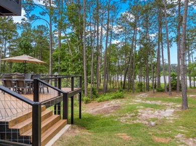 Experience unparalleled lakeside living at 147 Brushwood Ct on Rayburn Country Club in Texas - for sale on GolfHomes.com, golf home, golf lot