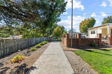 This 4 bedroom ranch home exudes timeless charm & has been on Meadowbrook Country Club in Missouri - for sale on GolfHomes.com, golf home, golf lot