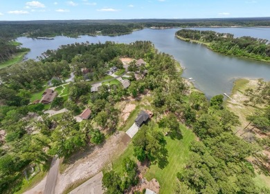 Experience unparalleled lakeside living at 147 Brushwood Ct on Rayburn Country Club in Texas - for sale on GolfHomes.com, golf home, golf lot