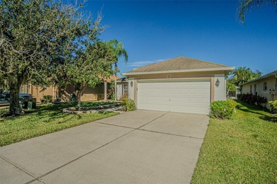 Beautiful, well maintained 3 bedroom, 2 bath home in the amazing on Tampa Bay Golf and Country Club in Florida - for sale on GolfHomes.com, golf home, golf lot