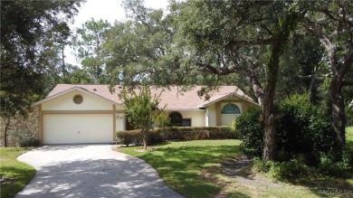 Discover this spacious 3/2.5/2 residence nestled on a cul-de-sac on Sugarmill Woods Golf and Country Club in Florida - for sale on GolfHomes.com, golf home, golf lot