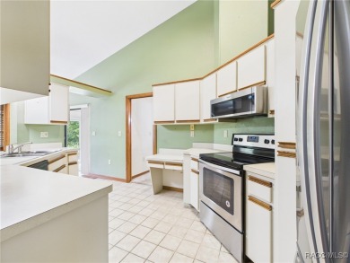 Discover this spacious 3/2.5/2 residence nestled on a cul-de-sac on Sugarmill Woods Golf and Country Club in Florida - for sale on GolfHomes.com, golf home, golf lot