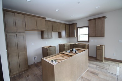 The Emerson is a 3 bed, 2.5 bath home on a lookout basement lot on Twin Lakes Country Club in Wisconsin - for sale on GolfHomes.com, golf home, golf lot