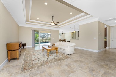 Laid Back Luxury with a 3-Car Garage and Private Pool in Rotonda on Pinemoor West Golf Club in Florida - for sale on GolfHomes.com, golf home, golf lot