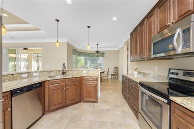 Laid Back Luxury with a 3-Car Garage and Private Pool in Rotonda on Pinemoor West Golf Club in Florida - for sale on GolfHomes.com, golf home, golf lot