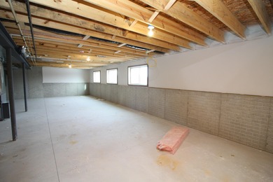 The Emerson is a 3 bed, 2.5 bath home on a lookout basement lot on Twin Lakes Country Club in Wisconsin - for sale on GolfHomes.com, golf home, golf lot