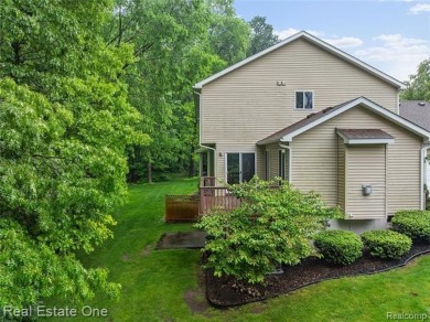 Move-in ready colonial tucked at the end of a peaceful on Whispering Pines Golf  in Michigan - for sale on GolfHomes.com, golf home, golf lot