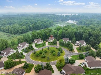Move-in ready colonial tucked at the end of a peaceful on Whispering Pines Golf  in Michigan - for sale on GolfHomes.com, golf home, golf lot