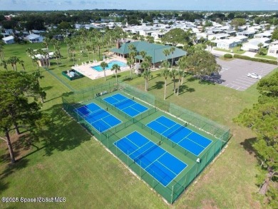 You have to check this one out! Chipewa Drive is one the BEST on Barefoot Bay Golf Course in Florida - for sale on GolfHomes.com, golf home, golf lot